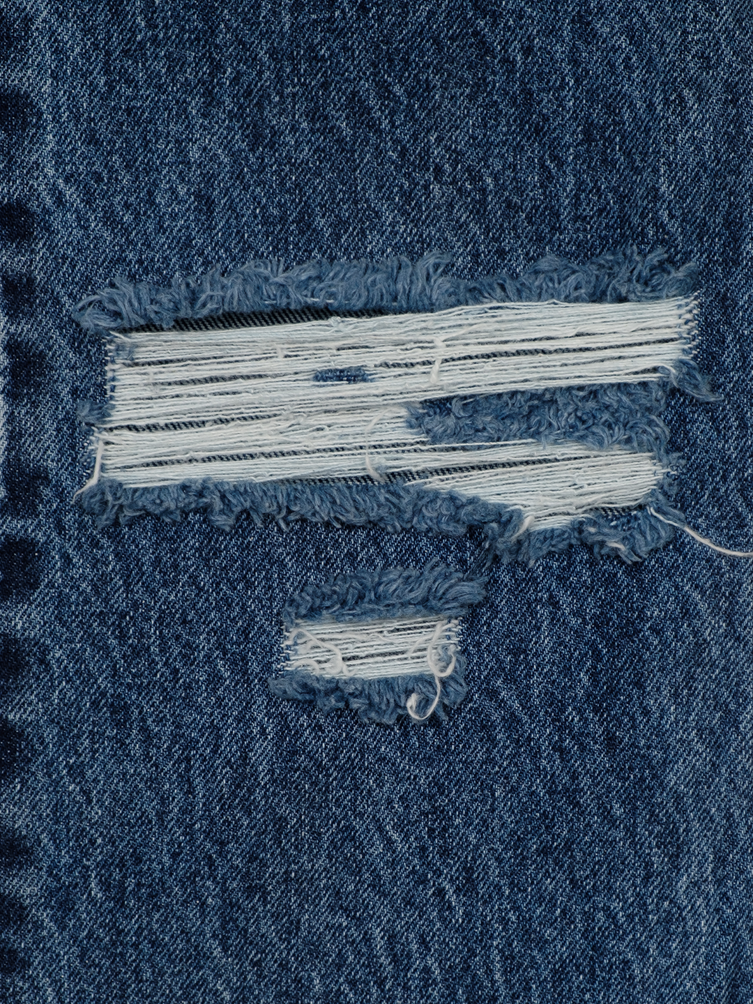 DISTRESSED KNEES FLARED JEANS